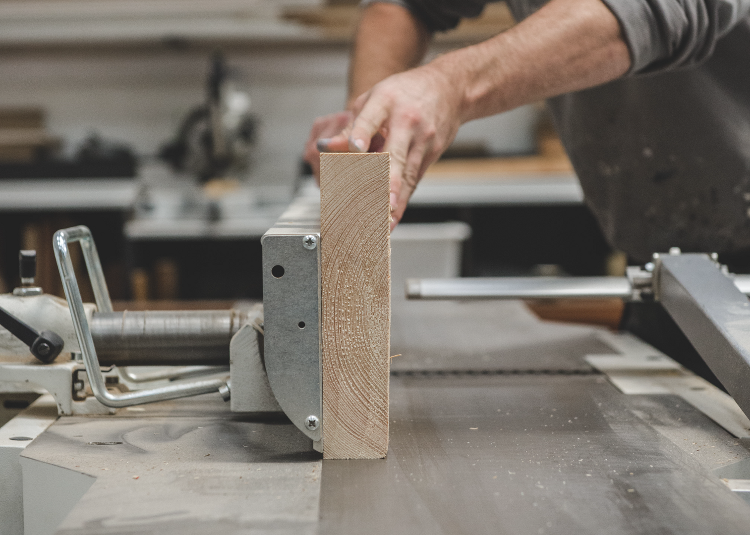 Carpenter working with wood at Moon Workshop